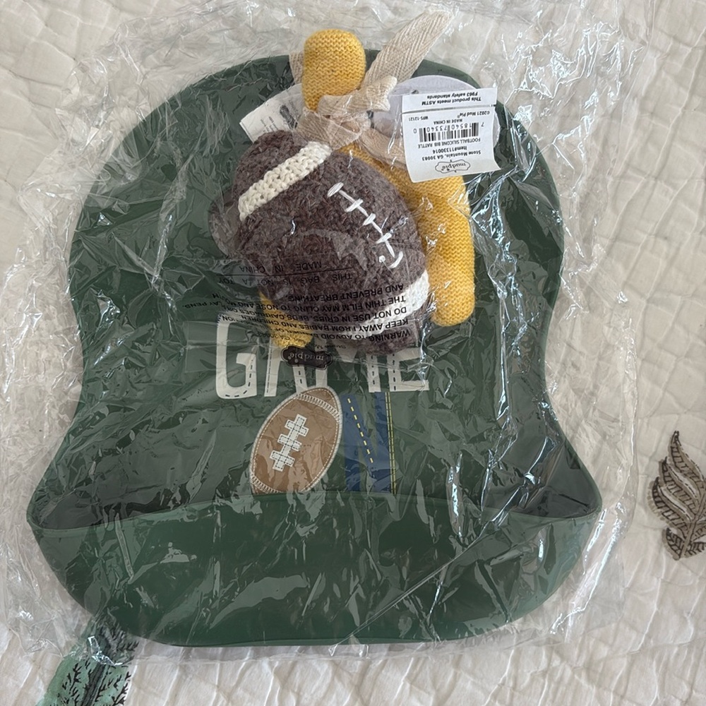 Football silicone bib and rattle for baby